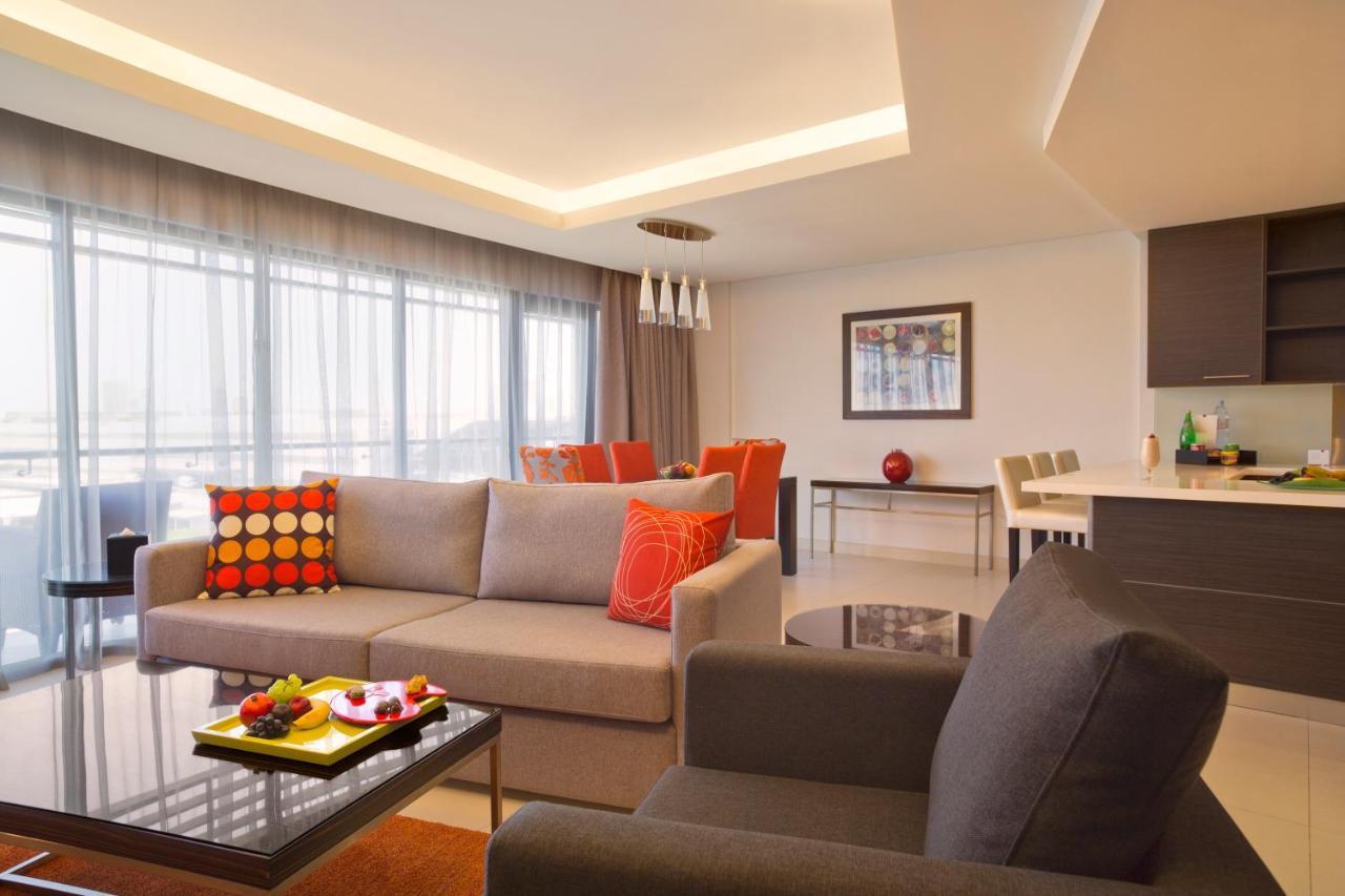 Majestic Arjaan By Rotana - Manama Aparthotel Exterior photo A living room in a serviced apartment in Kuala Lumpur, Malaysia