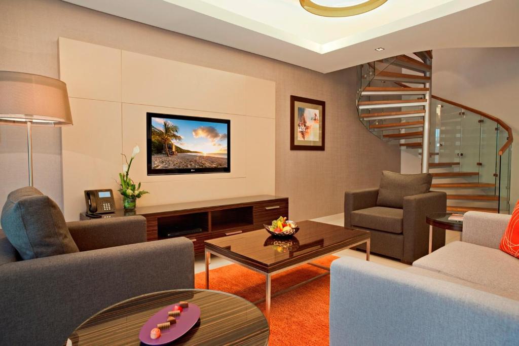 Majestic Arjaan By Rotana - Manama Aparthotel Exterior photo A living room