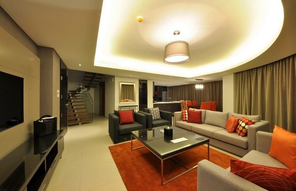 Majestic Arjaan By Rotana - Manama Aparthotel Room photo A living room in a condominium