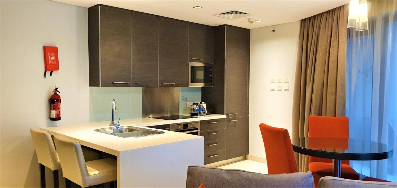 Majestic Arjaan By Rotana - Manama Aparthotel Exterior photo A kitchen in a serviced apartment